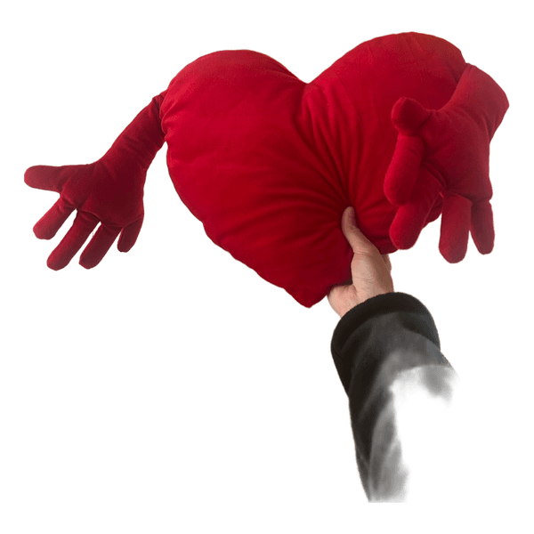 Red heart cushion with hands