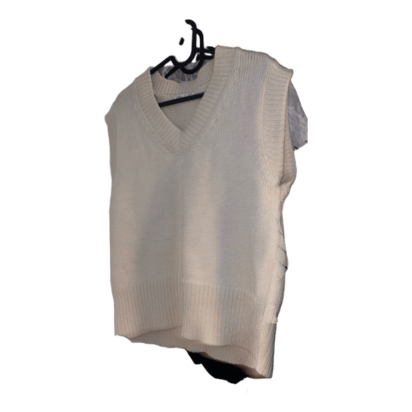 Beige knitted vest