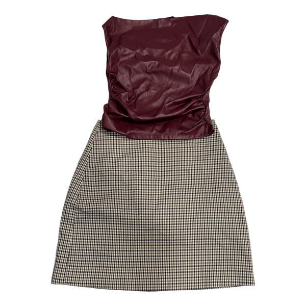 Burgundy faux leather top and a checked skirt