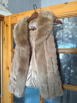 Beige faux fur vest