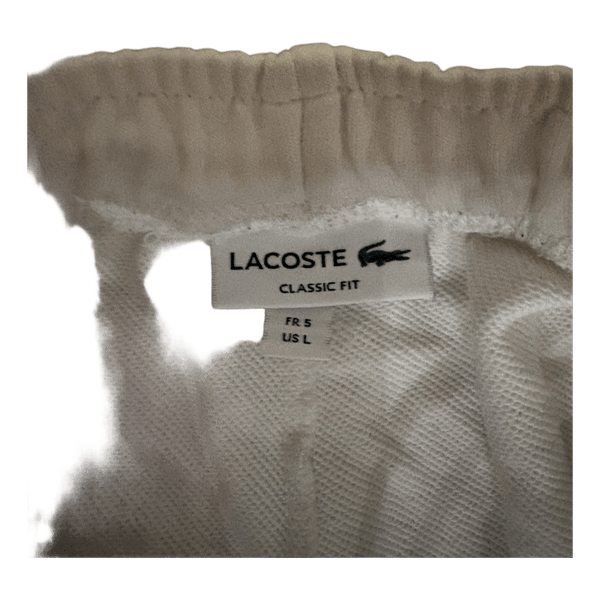 Valkoiset Lacoste collegehousut