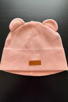 Pink knit beanie hat