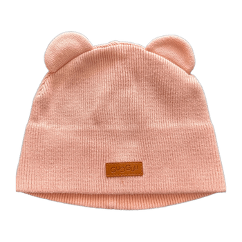 Pink knit beanie hat