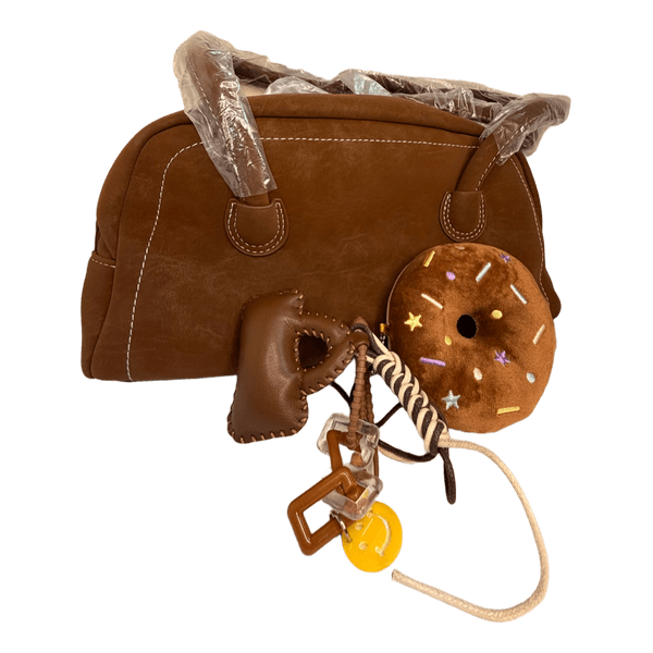 Brown shoulder bag with charms