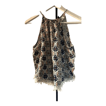 Kuvioitu hihaton pusero