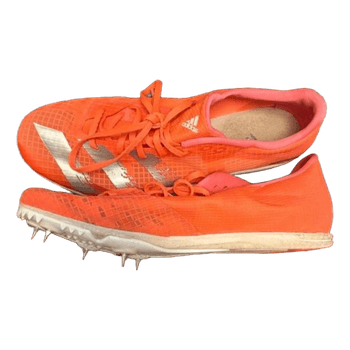 Orange Adidas track spikes