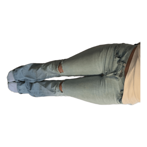 Ljusblå slitna jeans