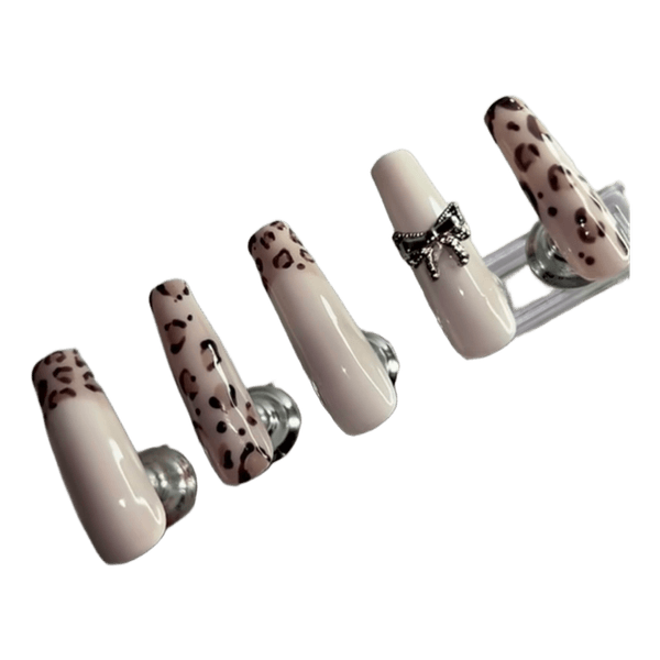 False nails with leopard print