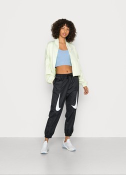 Black Nike tracksuit bottoms