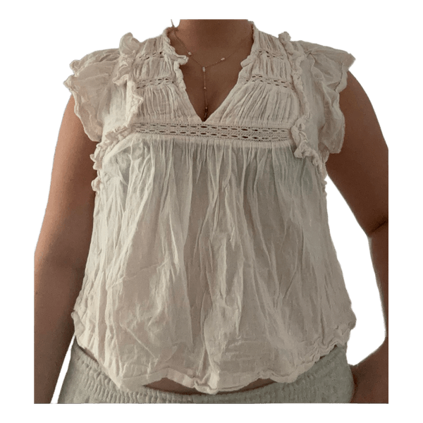 Lyserød bluse med flæser