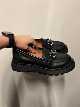 Black leather chain loafers