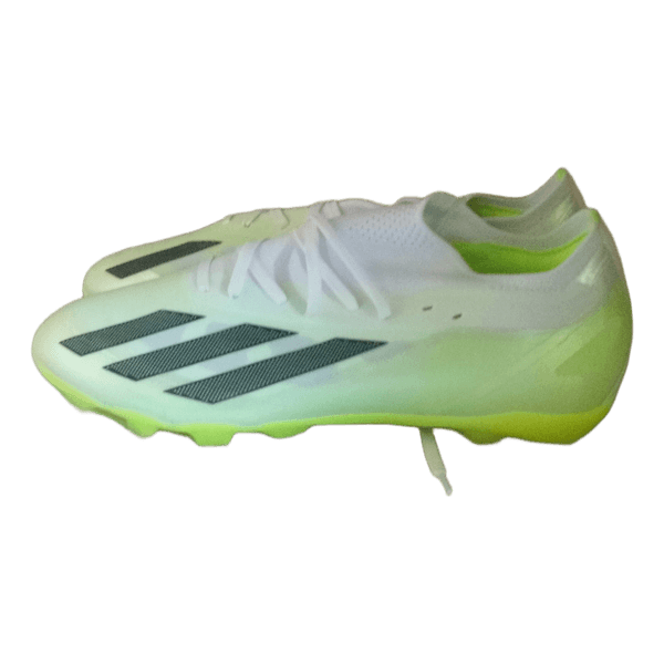 Green and white football boots