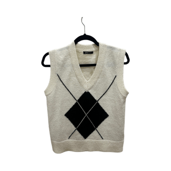 valkoinen neuleliivi