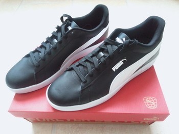 Black Puma sneakers