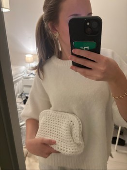 White knitted clutch bag