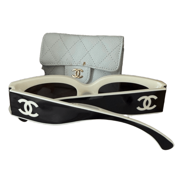 Sort og hvid solbrille