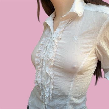 White ruffled cotton blouse