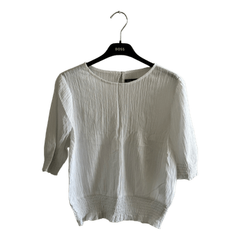 White pleated blouse
