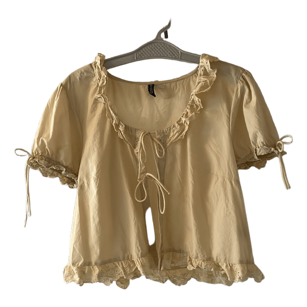 Lysegul bluse med flæser