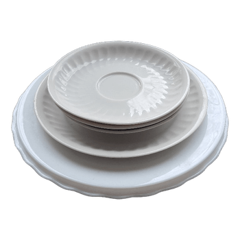 Set of white ceramic plates