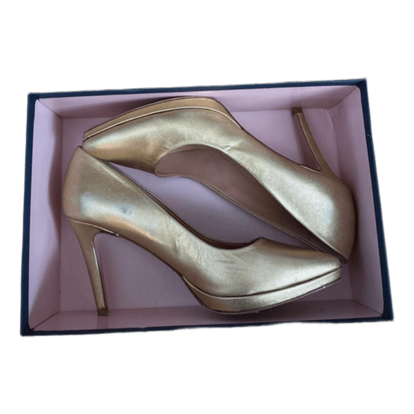 Gold pointed heels