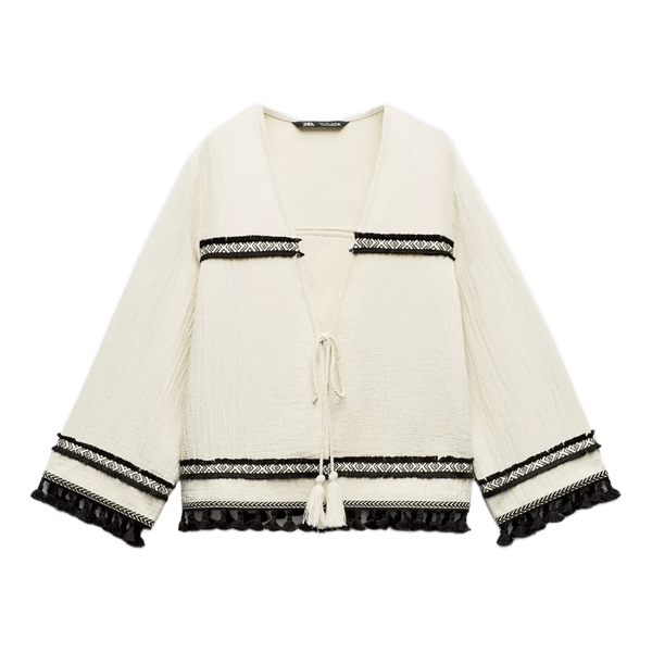 White fringed jacket
