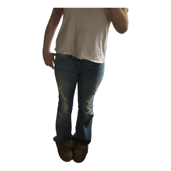 Blå slitna bootcut jeans