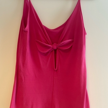 Pink sleeveless top with bow