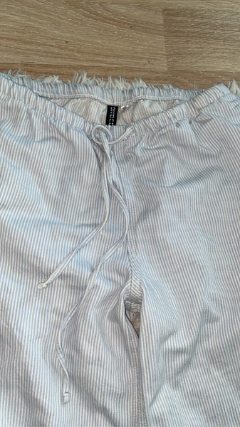 Blue striped trousers