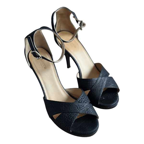 Black leather heeled sandals
