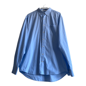 GANT Blue Oxford Shirt – Men’s Size L (41/42) – Regular Fit – 100% Cotton  Classic and high-quality GANT men’s shirt in a timeless light blue color. Made from 100% cotton broadcloth, offering a comfortable, breathable, and premium feel.  Perfect for office wear, business casual outfits, or everyday smart dressing.  Details: 	•	Brand: GANT 	•	Model: The Broadcloth – Regular Fit 	•	Size: L (41/42)