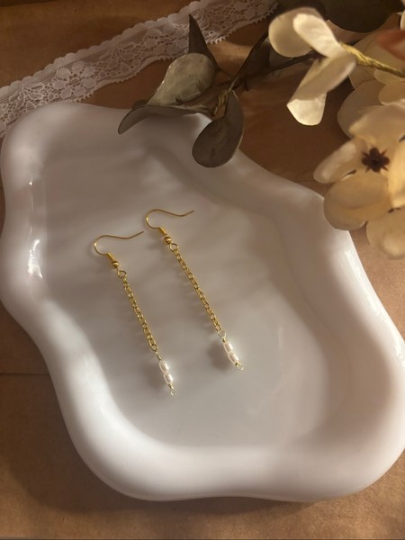 Lange guld øreringe
