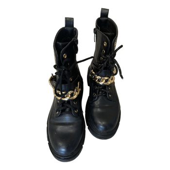 Black boots with chains