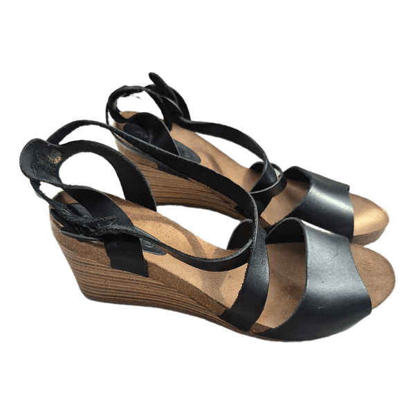 Black leather wedge sandals