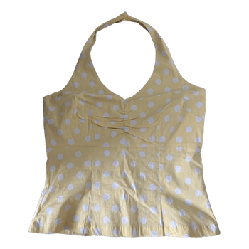 Keltainen pilkullinen toppi