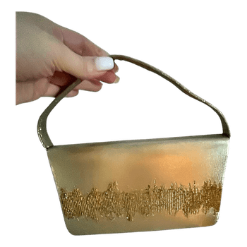 Rebecca Molenaar gold clutch