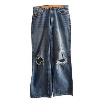 Blue distressed wide leg jeans