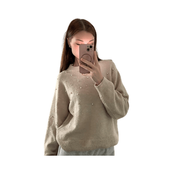 Vaaleanbeige neulepaita koristeilla