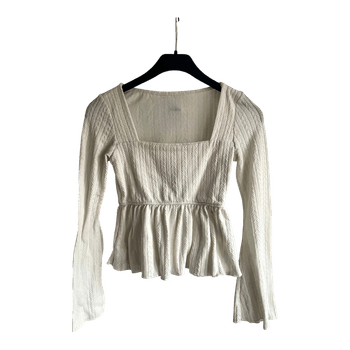 White long-sleeve top