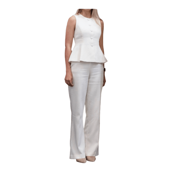 White peplum top and trousers