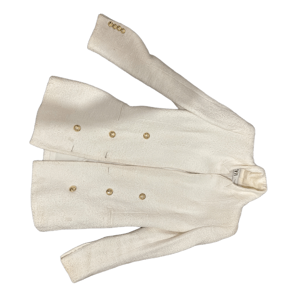 White blazer with gold buttons