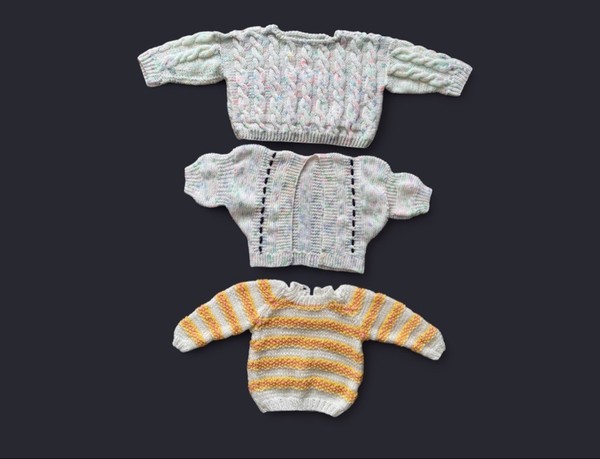 Knitted baby sweaters set