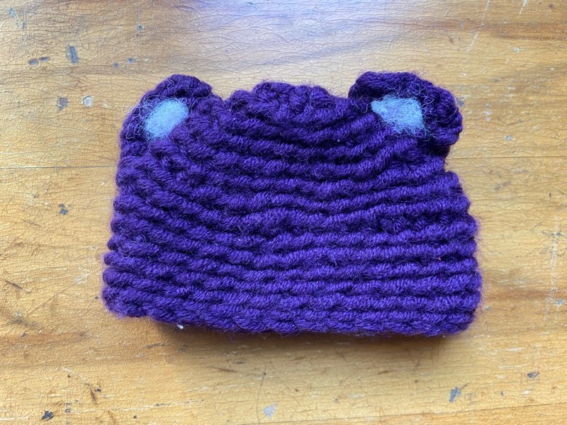 Knitted purple bear hat