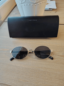 Oval gold sunglasses
