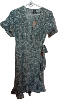 Green polka dot wrap dress