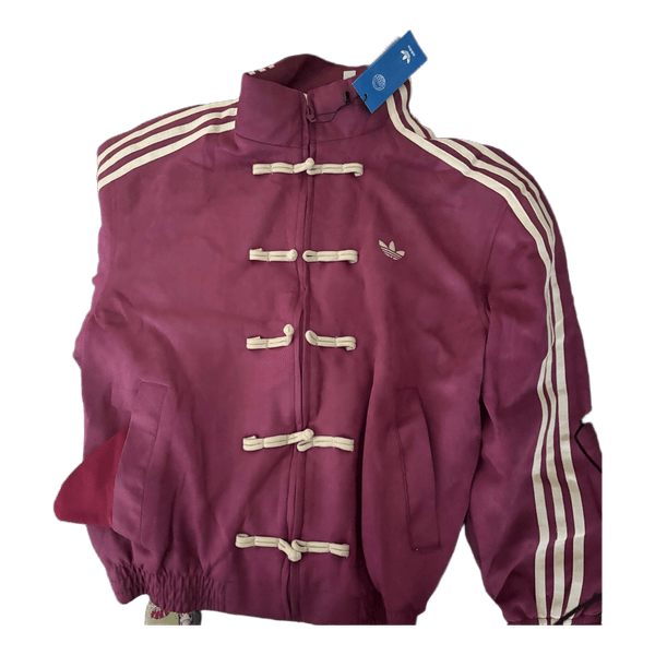 Punainen adidas verryttelytakki