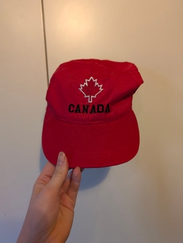 Red baseball cap with Canada logo