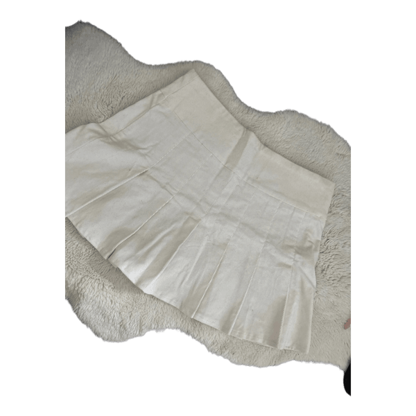 White pleated mini skirt