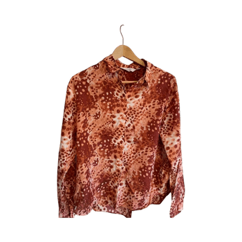 Oranssi kuviollinen paita
