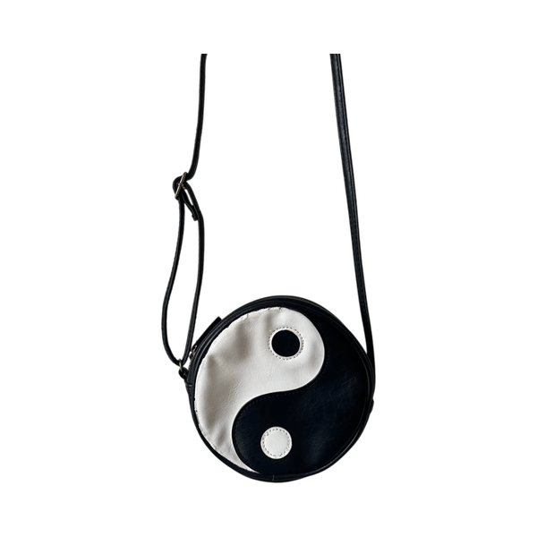 Pyöreä yin-yang olkalaukku